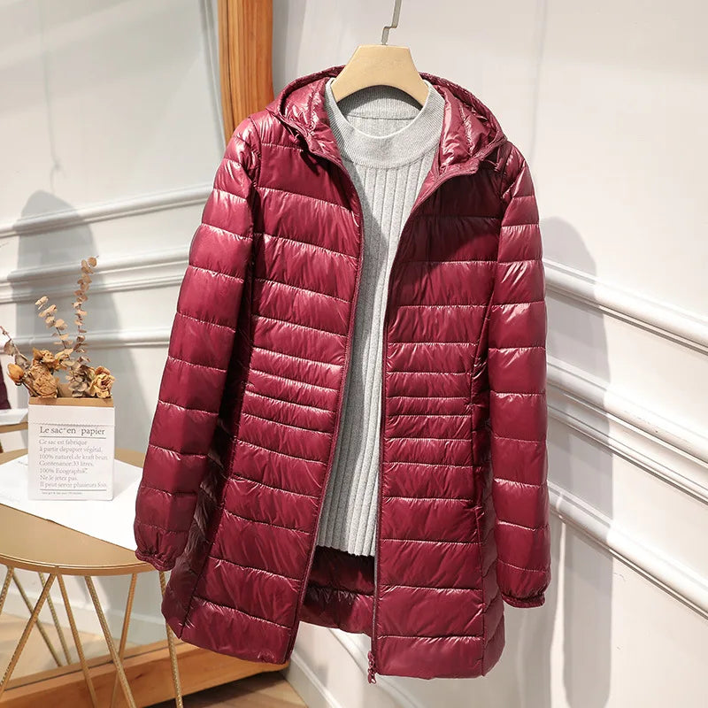 Sylis-Mode - Long down jacket for women with hood