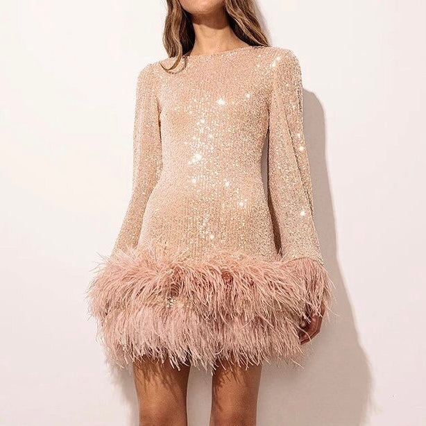 Sylis | Glamorous dress with sequins and feather hem