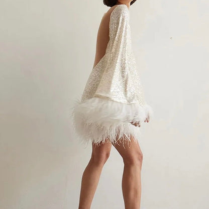 Sylis glamorous with sequins and feather hem