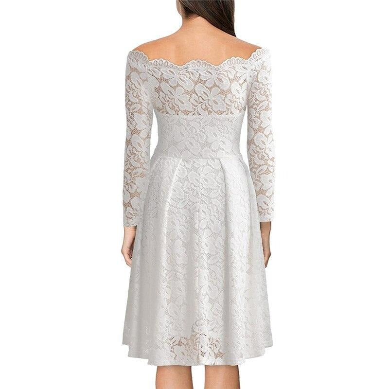 Sylis | Lace dress with slit at the neckline and sleeves