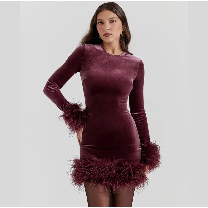 Sylis tube dress with feather accents on the sleeves