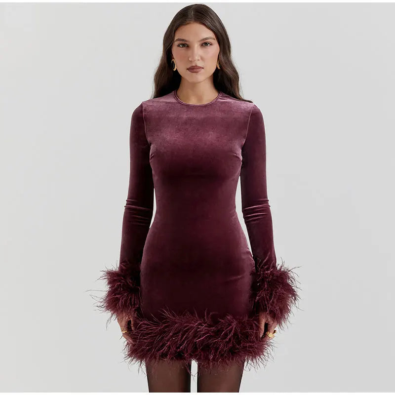 Sylis tube dress with feather accents on the sleeves