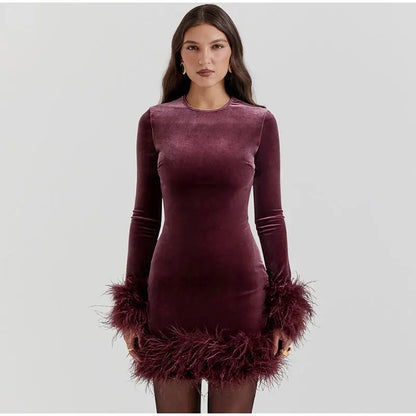 Sylis tube dress with feather accents on the sleeves