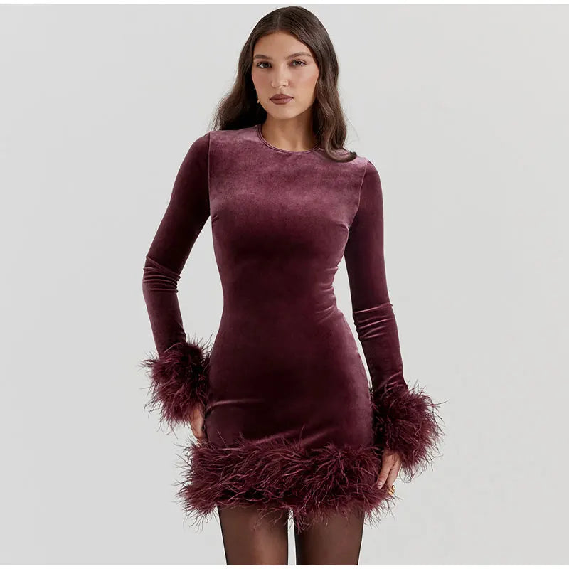 Sylis tube dress with feather accents on the sleeves