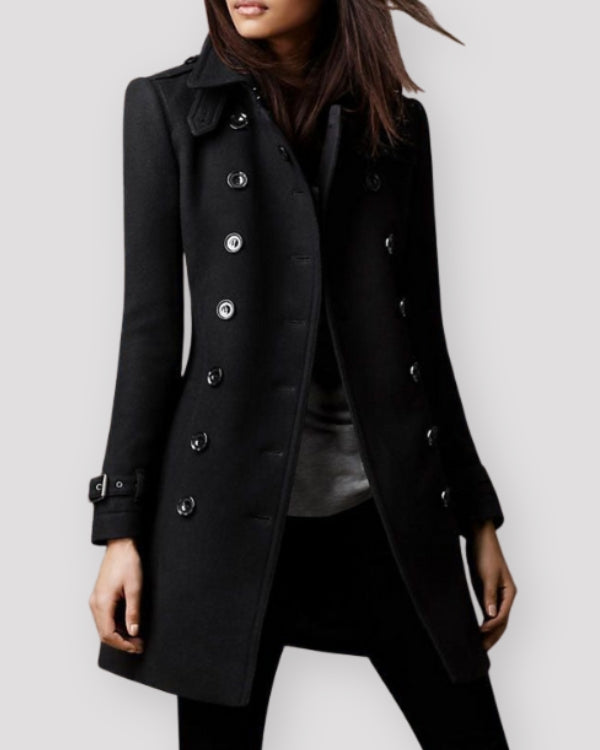 Black coat worn by a person on a white background