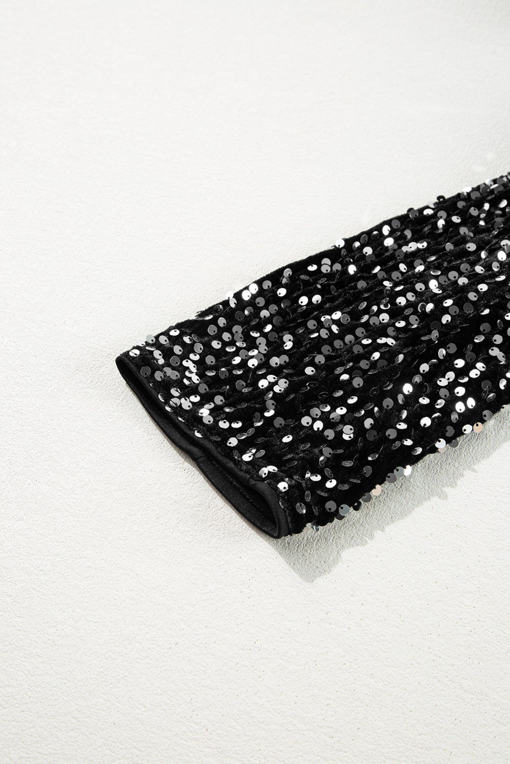 Sylis with sequins and open front