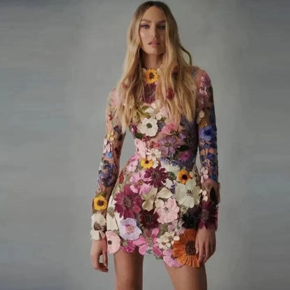 Sylis | Mini dress with floral appliques and a transparent look