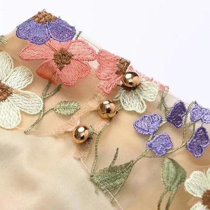 Sylis | Mini dress with floral appliques and a transparent look